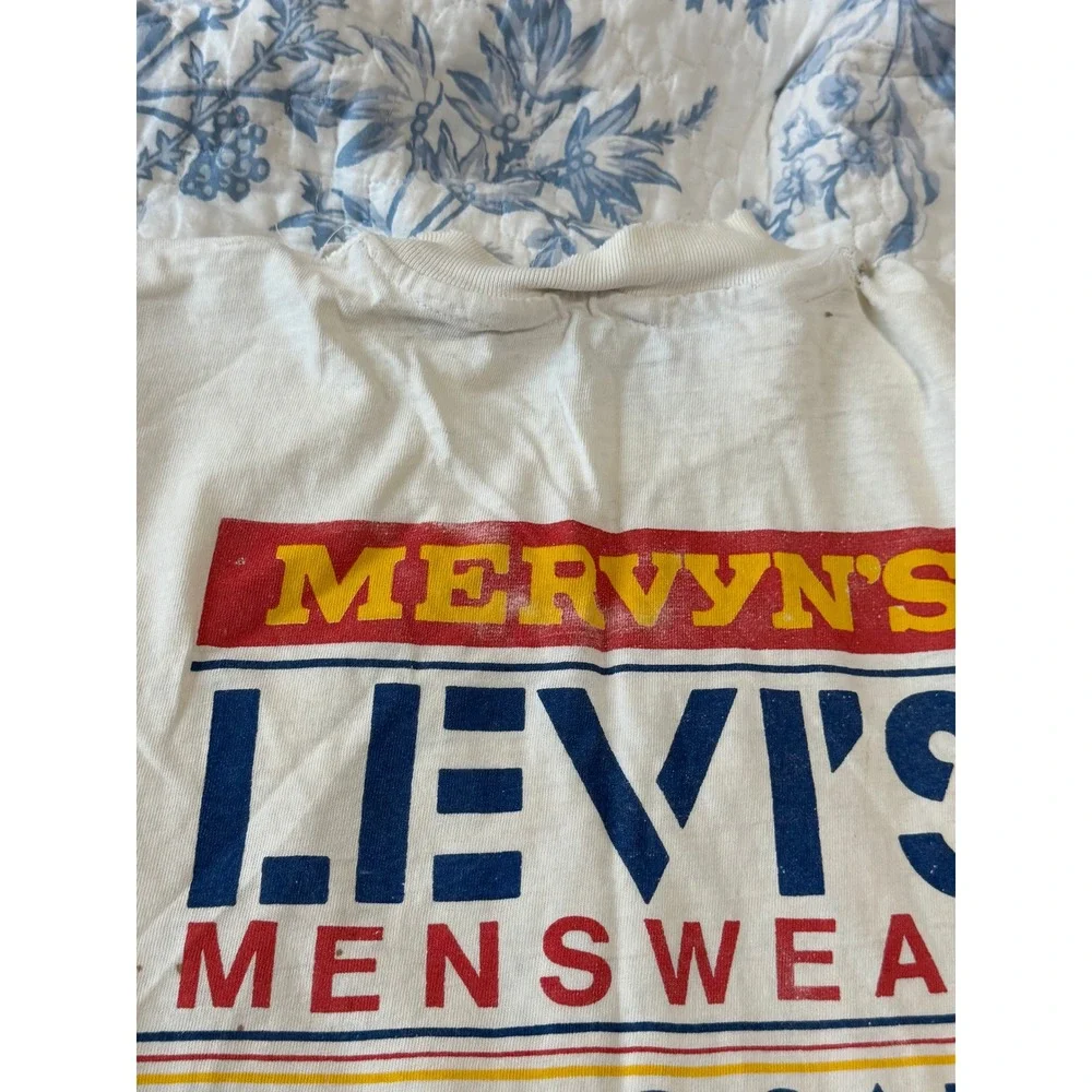 Vintage 1988 Levis Menswear Mervyns Spring Sale T-Shirt White Medium Distressed